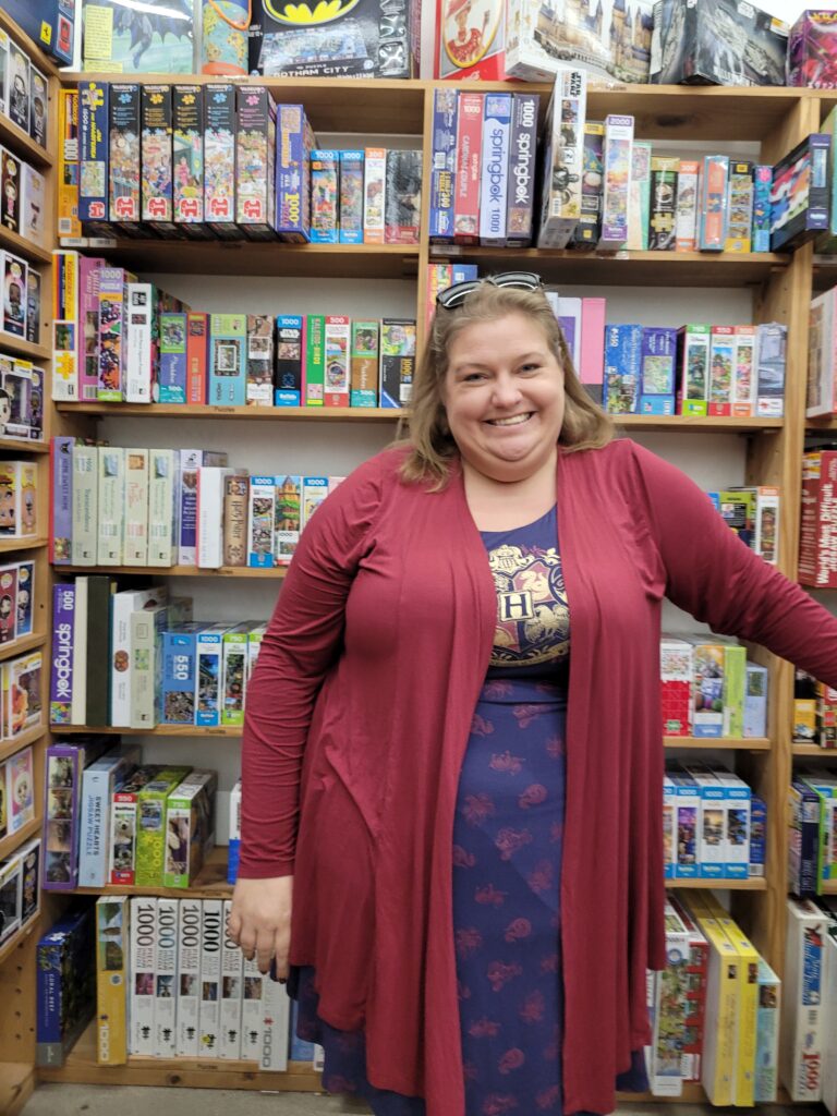 Puzzling as a Hobby - Me at one of my favorite places: the puzzle aisle of Half Price Books